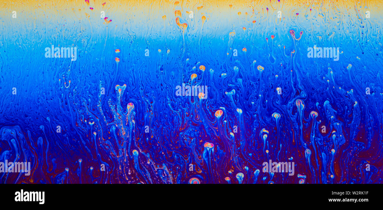 Abstract patterns space fantasy reflection cosmic on a soap bubble. Stock Photo