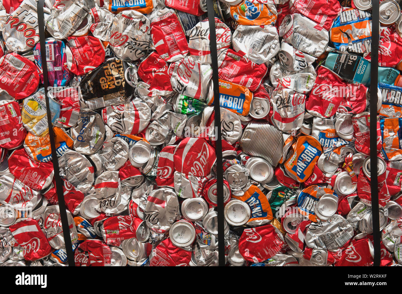 Crushed aluminium cans for processing at a recycling plant Stock Photo