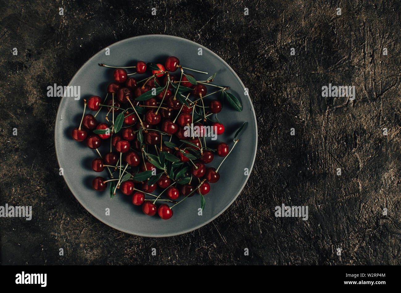 Closeup bright red cherry hi-res stock photography and images - Alamy