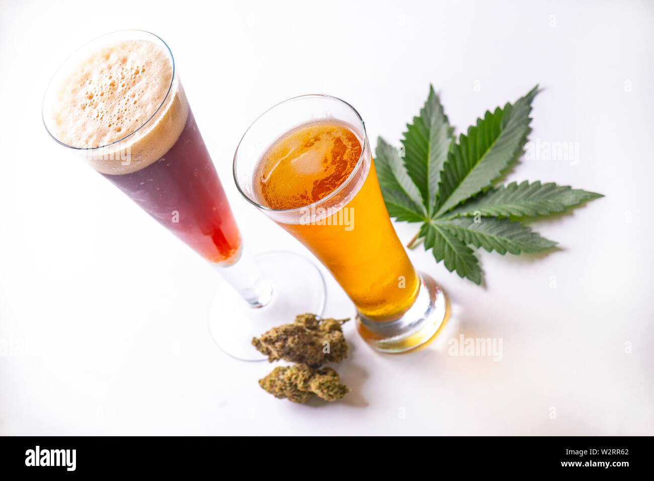 Nug Isolated Detail of cold glasses of beer with cannabis leaf and nugs isolated ...