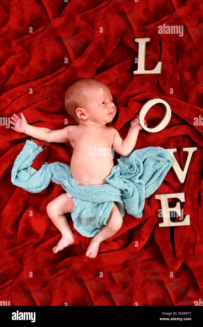 new born baby boy LOVE Stock Photo