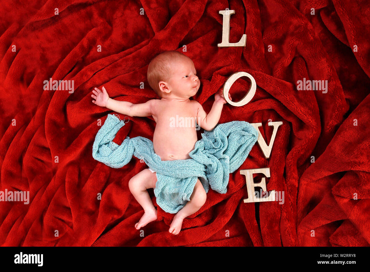 new born baby boy relaxing Stock Photo