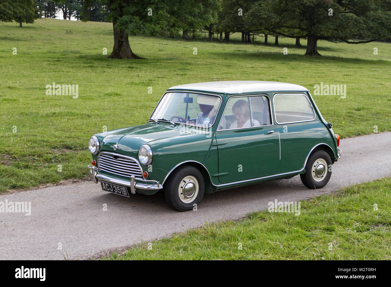 Vintage classic restored historic vehicles cars arriving at the