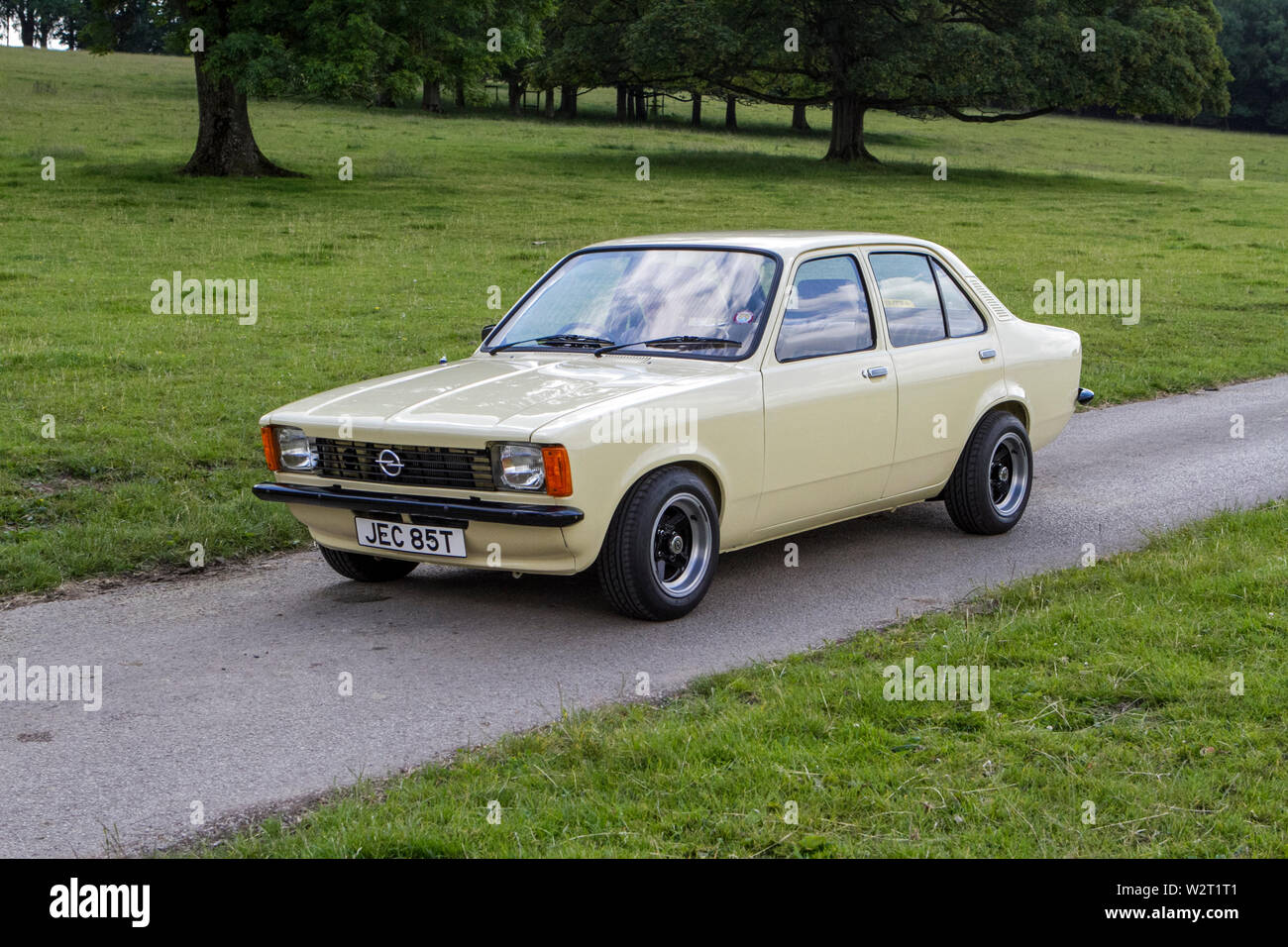 Vintage classic restored historic vehicles cars arriving at the