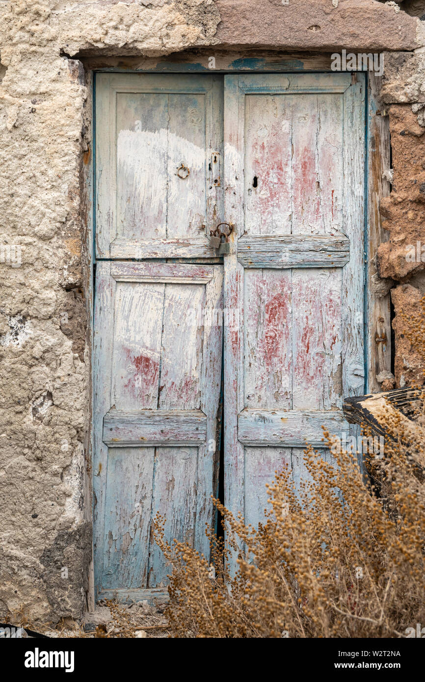 Broken old door in Akrotiri, Santorini Stock Photo