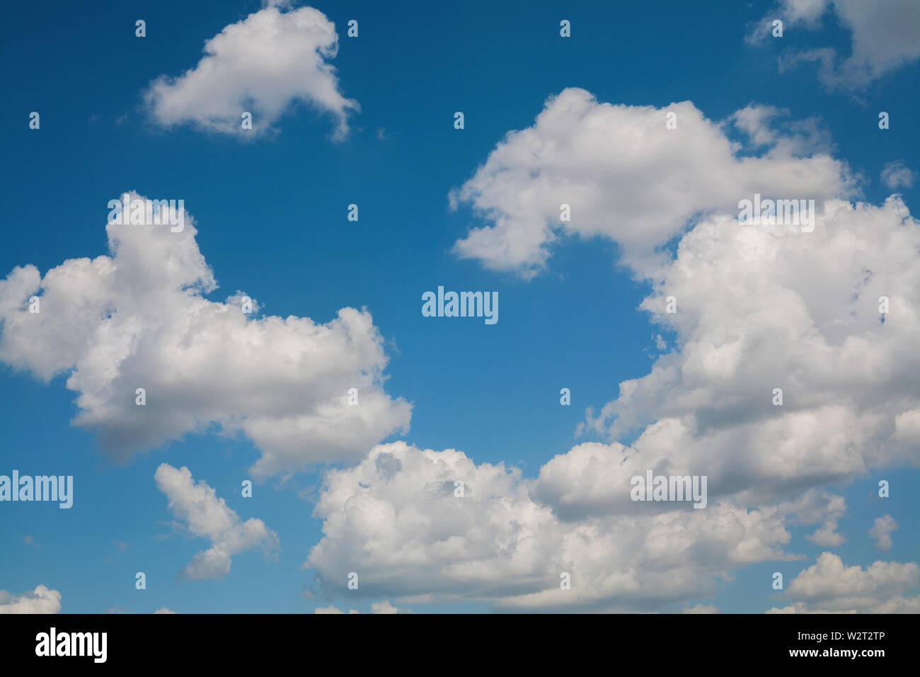 Blue sky with clouds, natural background Stock Photo - Alamy