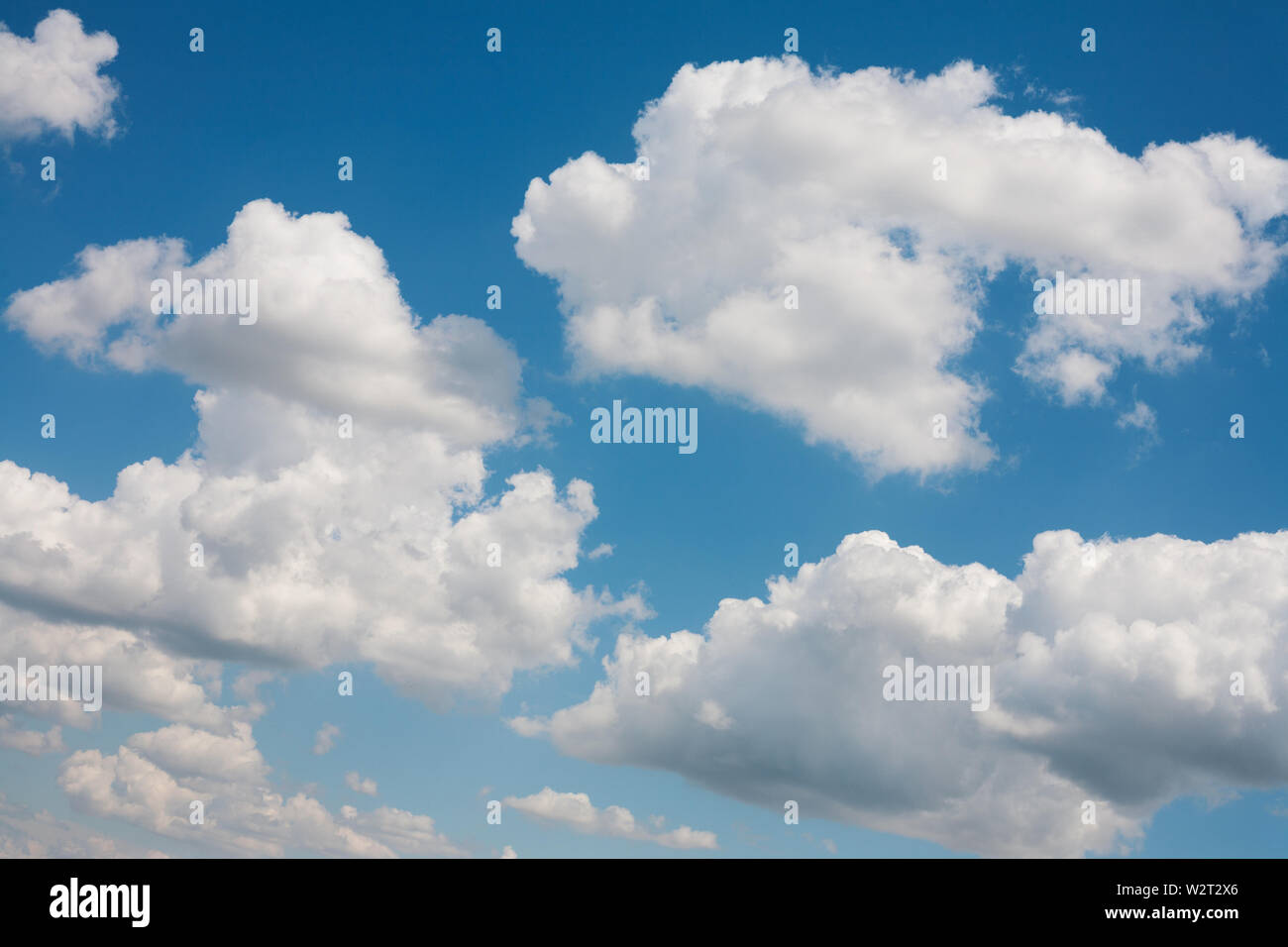 Blue sky with clouds, natural background Stock Photo - Alamy