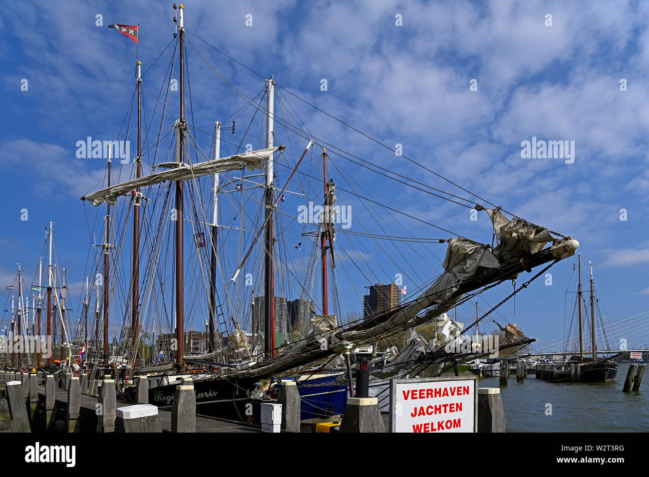 rotterdam,  netherlands - march 31, 2019: traditional sailing ships berthed at veerhaven and nieuwe maas river in the historic scheepvaartkwartier (sh Stock Photo