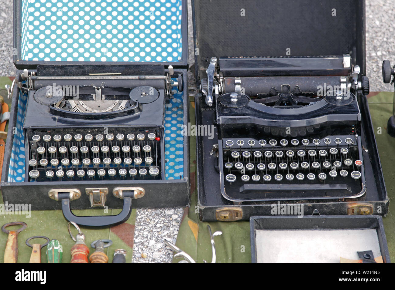 Vintage Cyrillic Typewriters for Sale at Flea Market Stock Photo