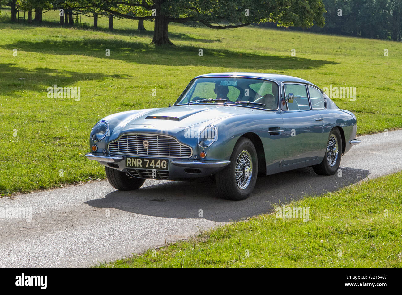 1969 60s Aston Martin DB6; Vintage classic restored historic vehicles cars arriving at the Leighton Hall car show in Carnforth, Lancaster, UK Stock Photo