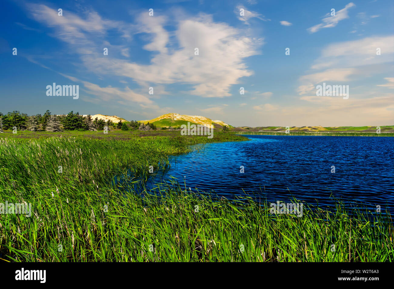 Sand dunes along the marsh in Greenwich at the PEI National Park ...