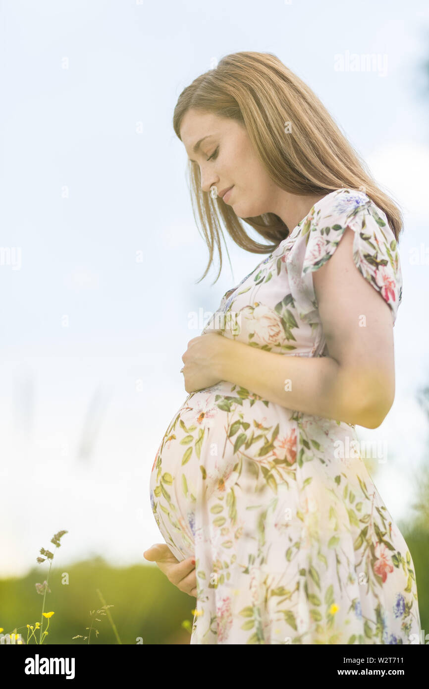 Pregnant woman in white hi-res stock photography and images - Alamy