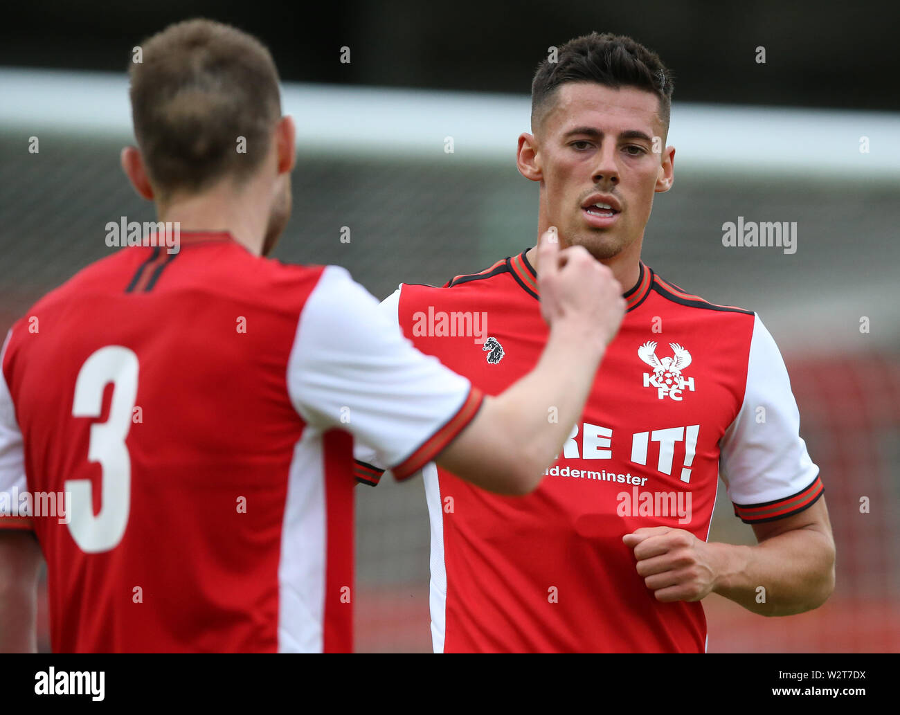 Kidderminster Harriers' Ed Williams (right) celebrates scoring his side's second goal of the game during the pre-season friendly at Aggborough Stadium, Kidderminster. Stock Photo