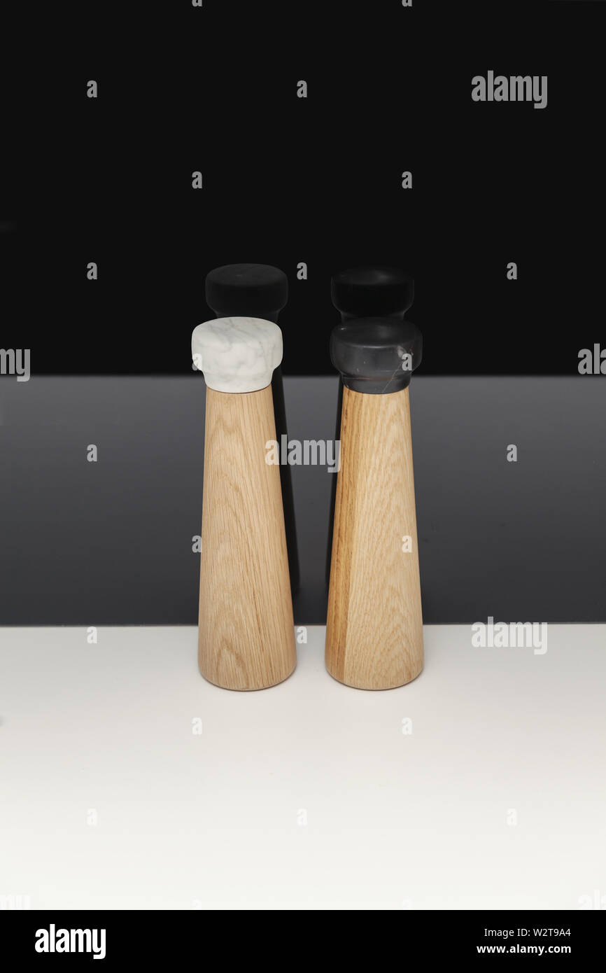 wooden containers for salt and pepper, black and white cover Stock