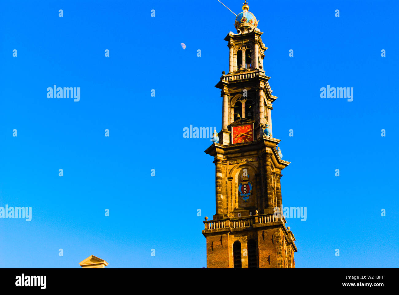 wester church amsterdam daytime with the moon in the background Stock Photo