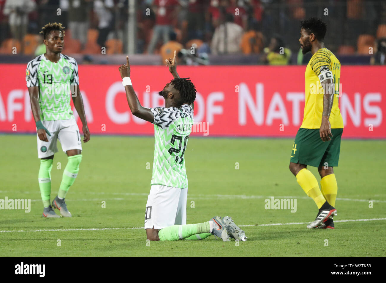 Cairo, Egypt. 10th July, 2019. Nigeria's Chidozie Awaziem (C) celebrates his team's victory after the 2019 Africa Cup of Nations quarter final soccer match between Nigeria and South Africa at the Cairo International Stadium. Credit: Oliver Weiken/dpa/Alamy Live News Stock Photo