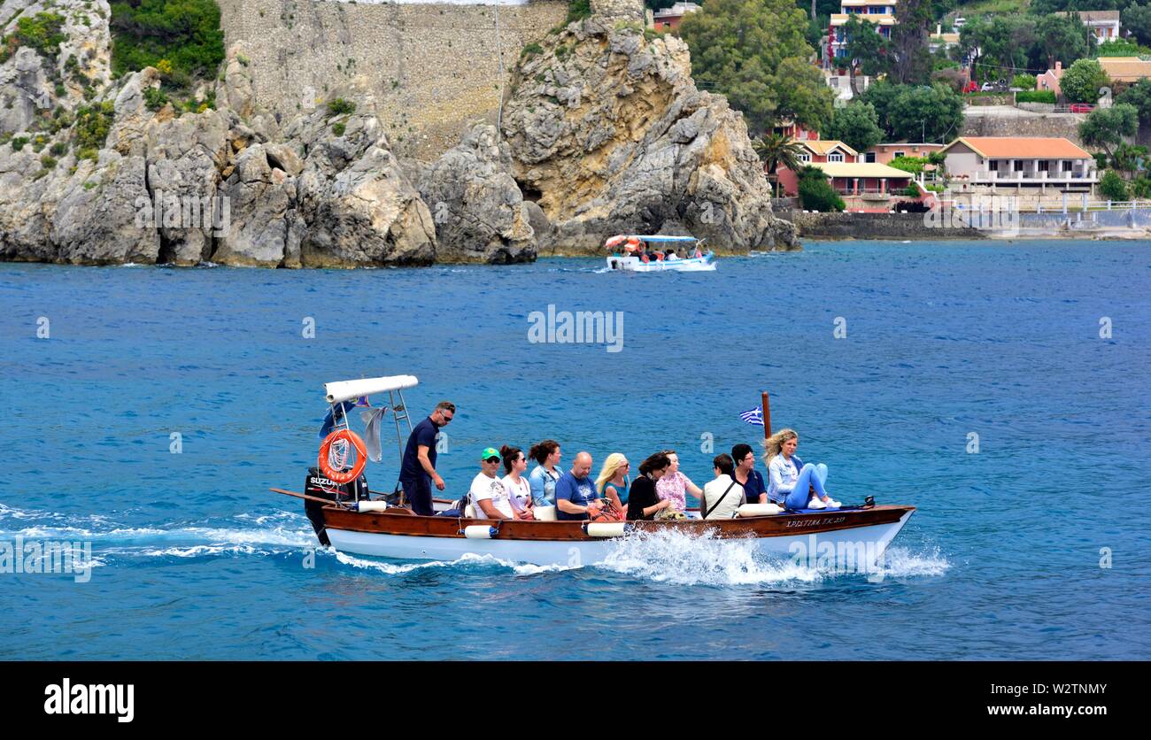 Tourists taking a boat trip,Paleokastritsa,Corfu,Greece Stock Photo