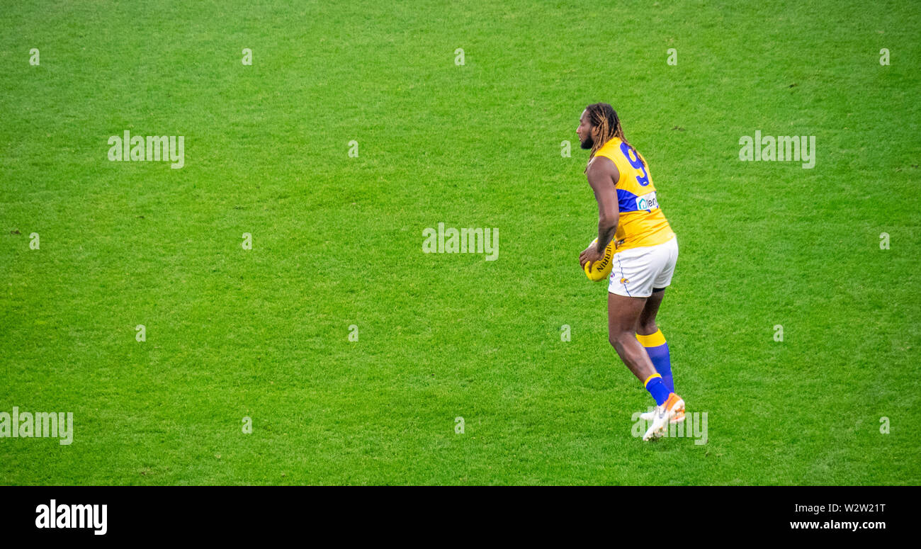 West Coast Eagles footballers Nic Naitanui warming up before the Western Derby at Optus Stadium Perth Western Australia. Stock Photo