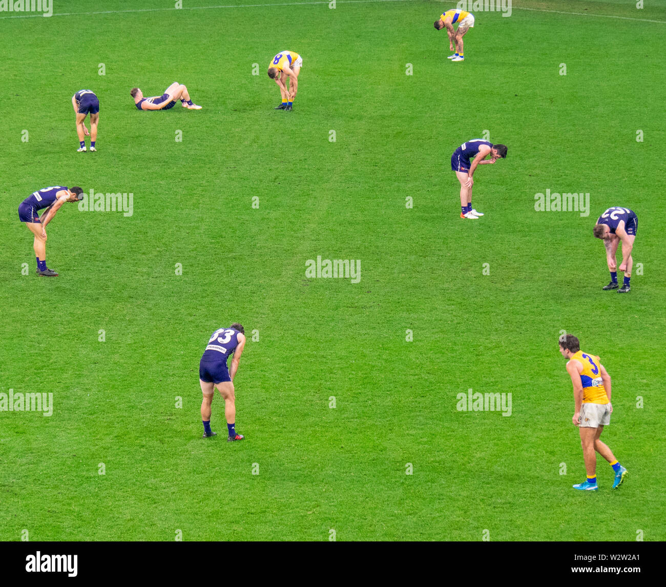 West Coast Eagles and Fremantle Dockers football players after the Western Derby AFL game at Optus Stadium Perth Western Australia. Stock Photo