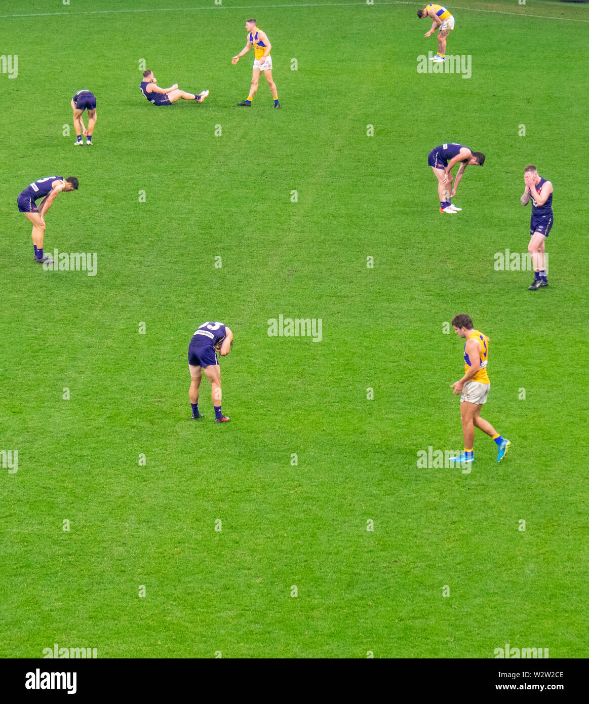 West Coast Eagles and Fremantle Dockers football players after the Western Derby AFL game at Optus Stadium Perth Western Australia. Stock Photo