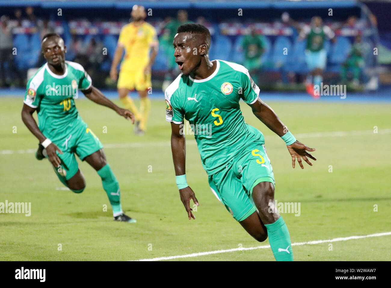Cairo, Egypt. 10th July, 2019. Idrissa Gana Gueye (Front) of Senegal celebrates scoring during the quarterfinal between Senegal and Benin at the 2019 African Cup of Nations in Cairo, Egypt, July 10, 2019. Credit: Wang Teng/Xinhua/Alamy Live News Stock Photo