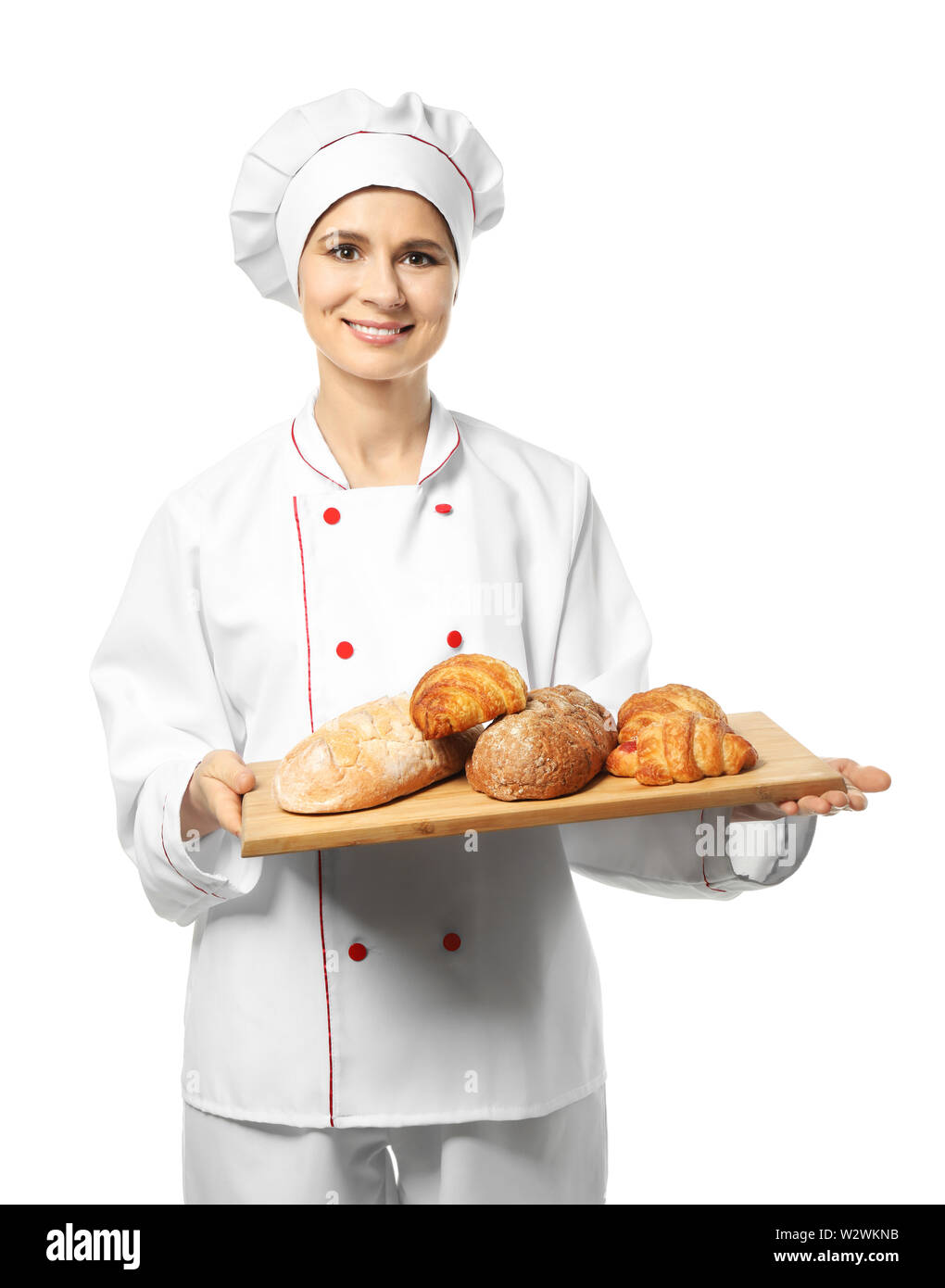 Female chef with bakery products on white background Stock Photo Alamy