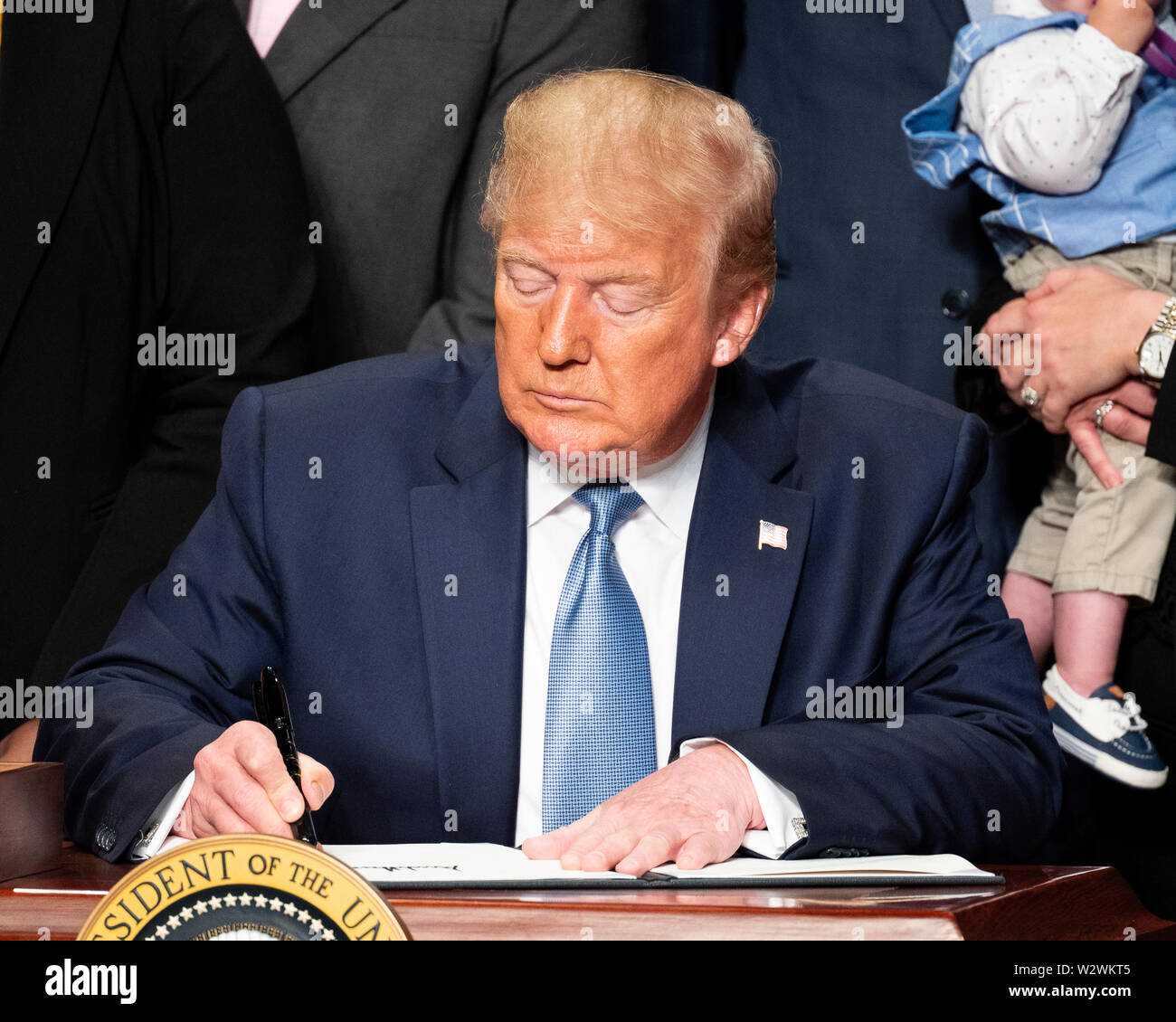Washington, United States. 10th July, 2019. President Donald Trump signs an Executive Order to Advance Kidney Health at the Ronald Reagan Building and International Trade Center in Washington, DC. Credit: SOPA Images Limited/Alamy Live News Stock Photo