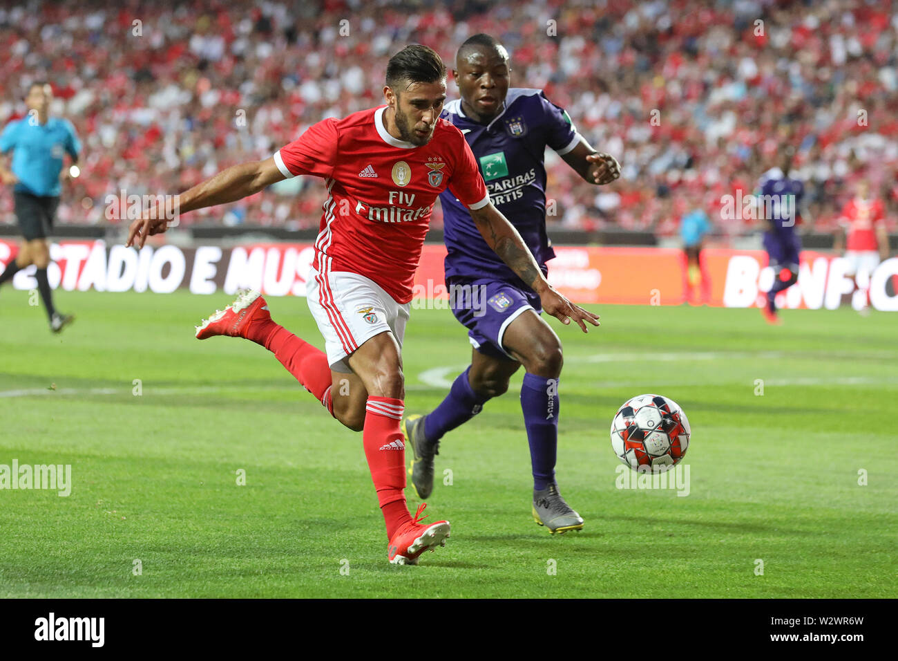 Lisbon, Portugal. 10th July, 2019. Toto Salvio of SL Benfica (L) vies for the ball with Edo Kayembe of Royal Sporting Club Anderlecht (R) during the Pre-Season football match 2019/2020 between SL Benfica vs Royal Sporting Club Anderlecht. (Final score: SL Benfica 1 - 2 Royal Sporting Club Anderlecht) Credit: SOPA Images Limited/Alamy Live News Stock Photo