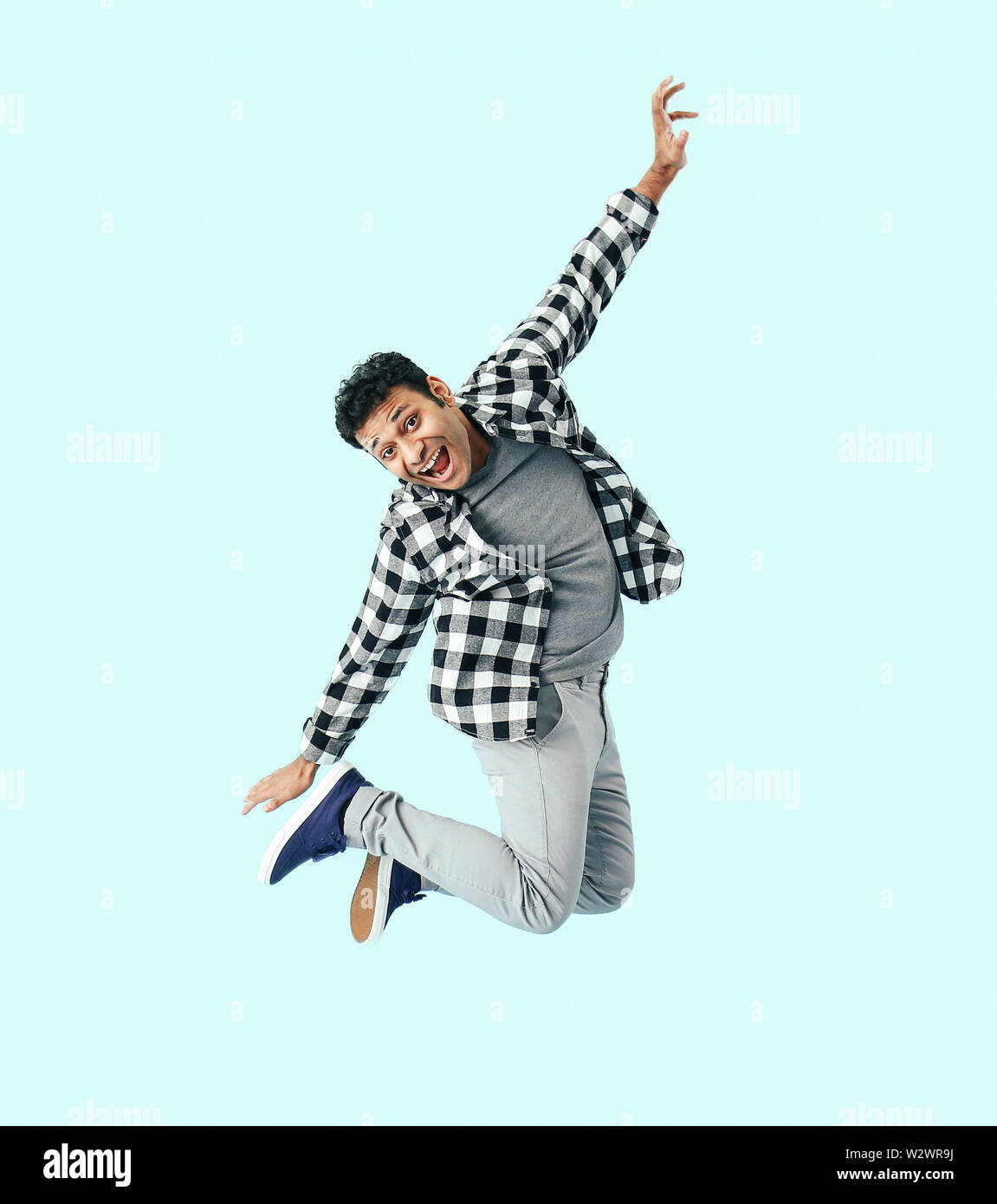 Funny jumping man on color background Stock Photo - Alamy Funny jumping man on color background Stock Photo - Alamy