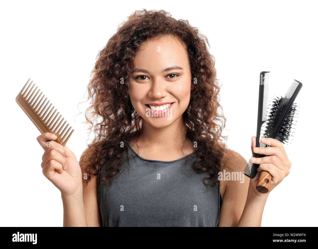 Beautiful African American Hairdresser On White Background Stock