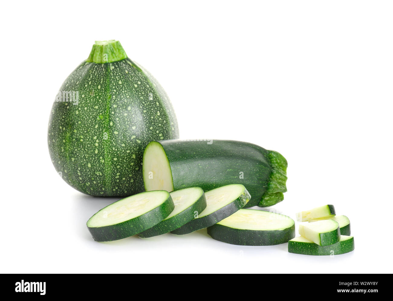 Fresh zucchini squashes on white background Stock Photo
