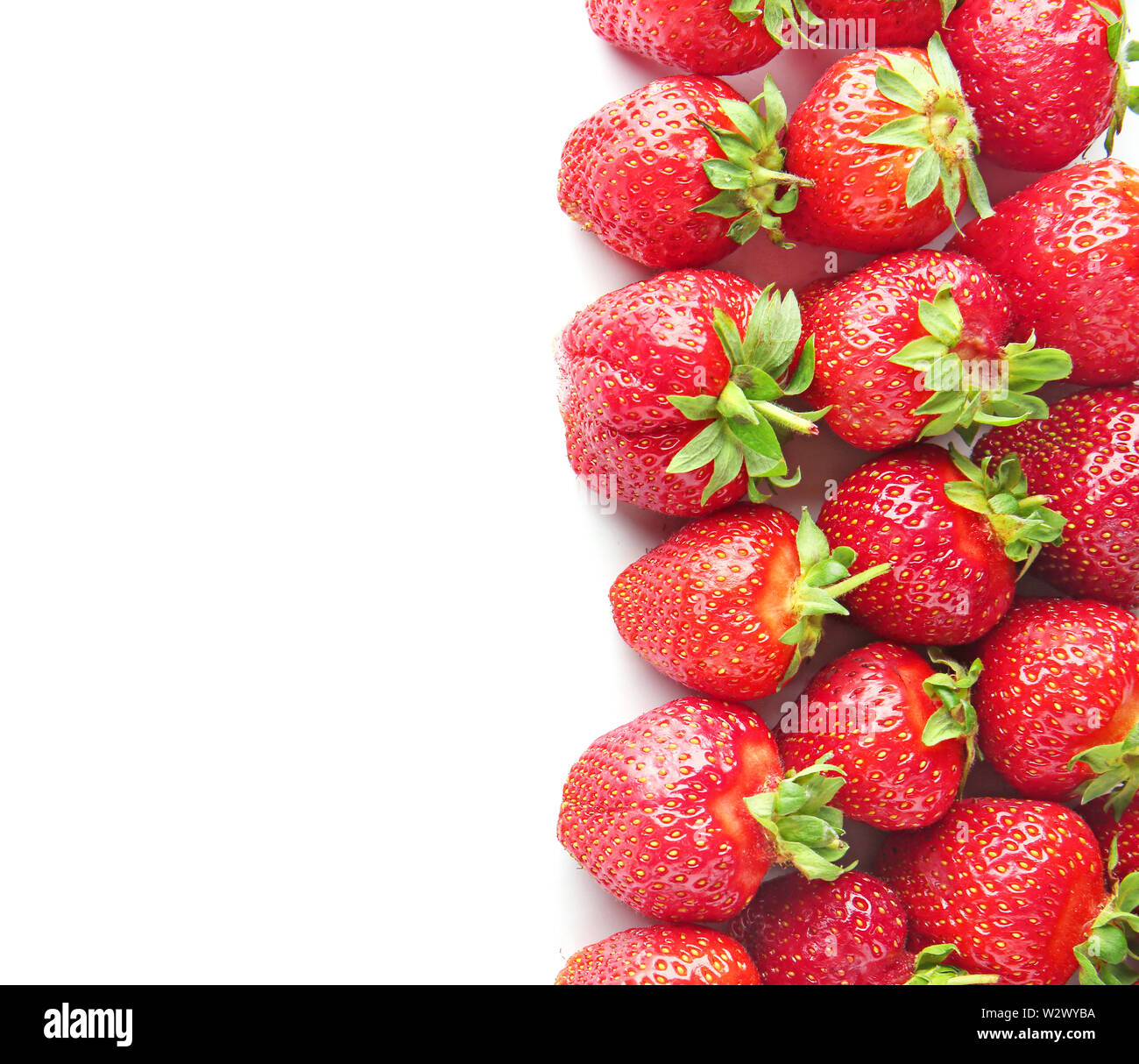 Sweet ripe strawberry on white background Stock Photo - Alamy