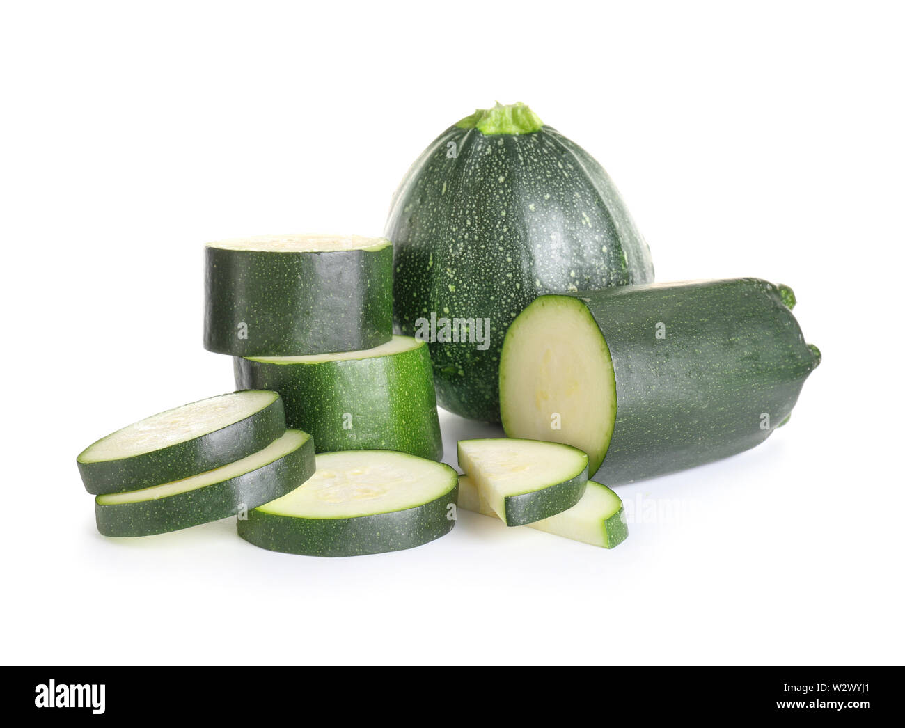 Fresh zucchini squashes on white background Stock Photo