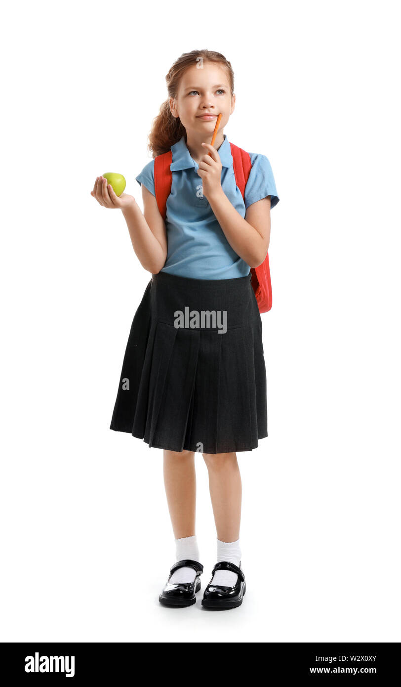 Cute little schoolgirl on white background Stock Photo - Alamy