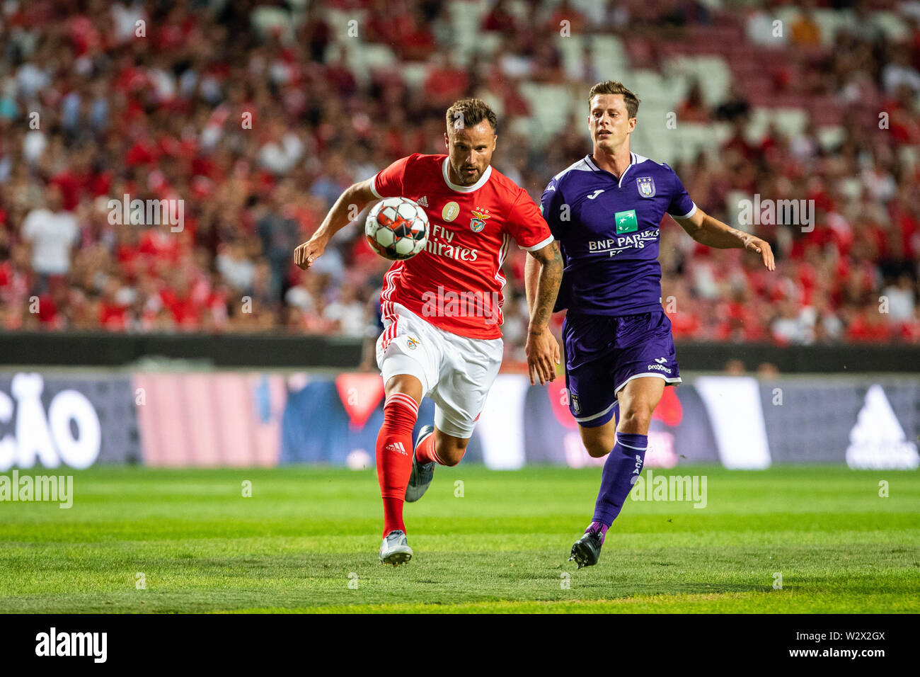 Lisbon, Portugal. 10th July, 2019. Haris Seferovic of SL Benfica vies for the ball with Jamie Lawrence of RSC Anderlecht during the Pre-Season football match 2019/2020 between SL Benfica vs Royal Sporting Club Anderlecht. (Final score: SL Benfica 1 - 2 Royal Sporting Club Anderlecht) Credit: SOPA Images Limited/Alamy Live News Stock Photo