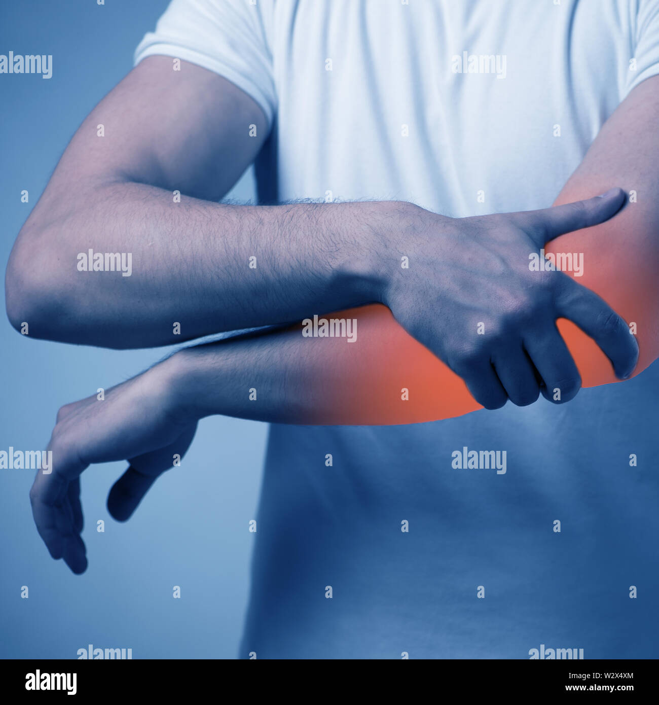 The man suffering from acute pain in elbow Stock Photo Alamy