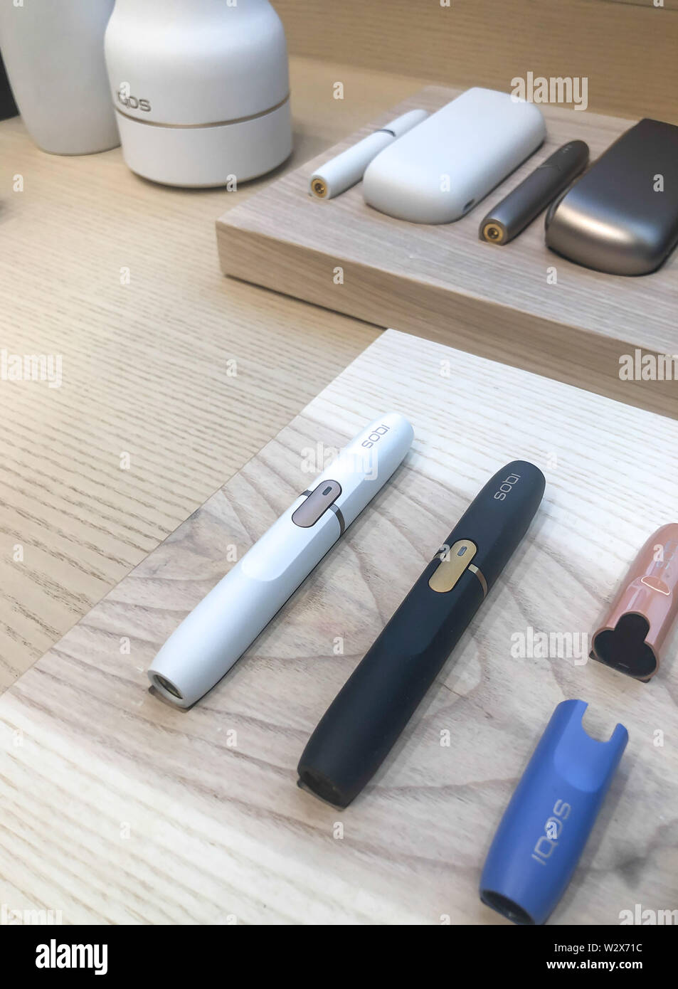 MOSCOW, RUSSIA - FEBRUARY 04, 2019: Iqos electronic cigarette philip morris in Iqos store Stock Photo