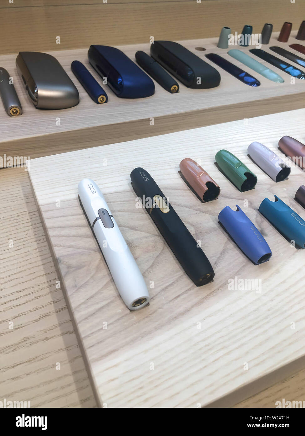 MOSCOW, RUSSIA - FEBRUARY 04, 2019: Iqos electronic cigarette philip morris in Iqos store Stock Photo