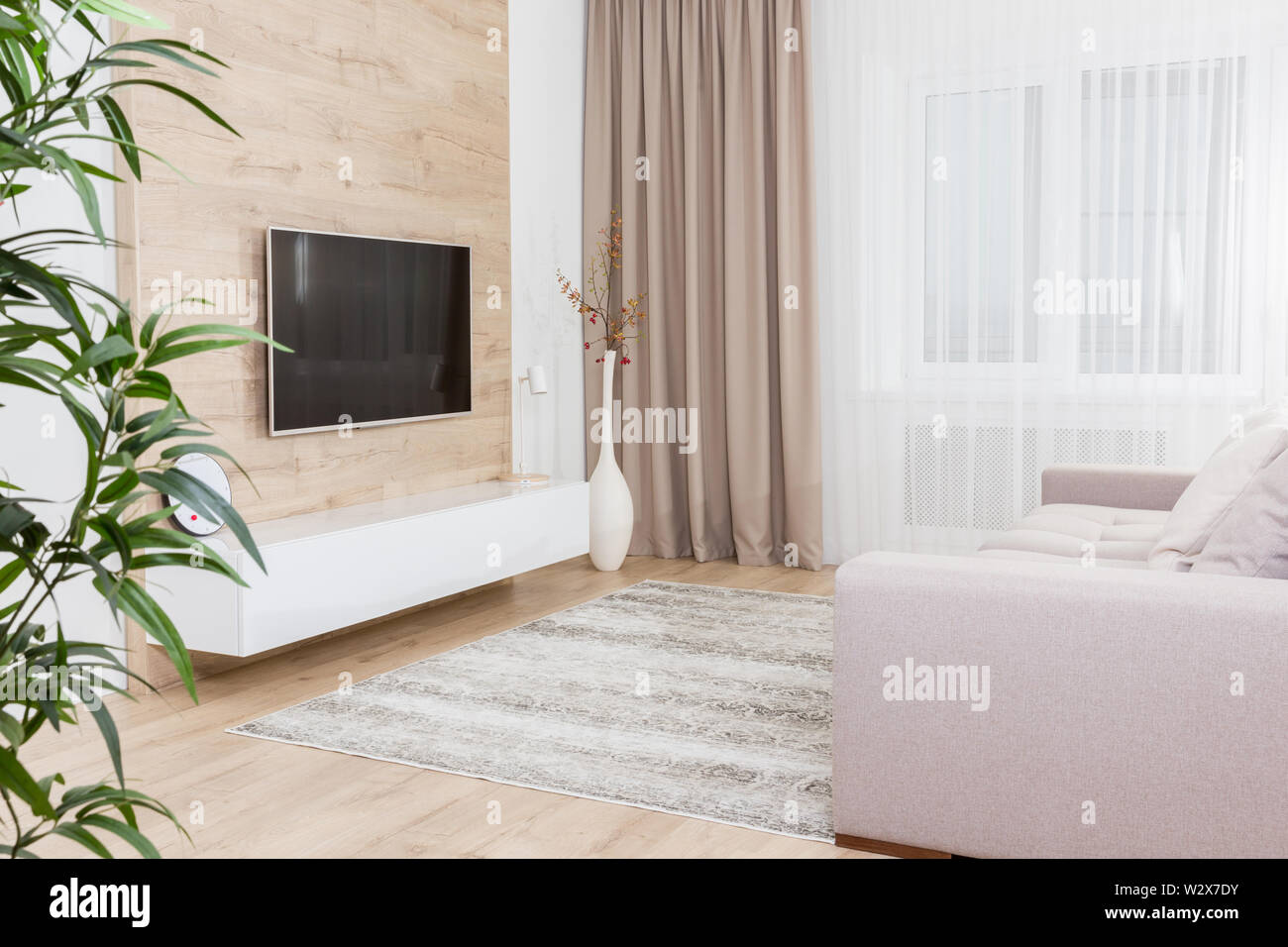 Modern living room with tv equipment and sofa Stock Photo Alamy