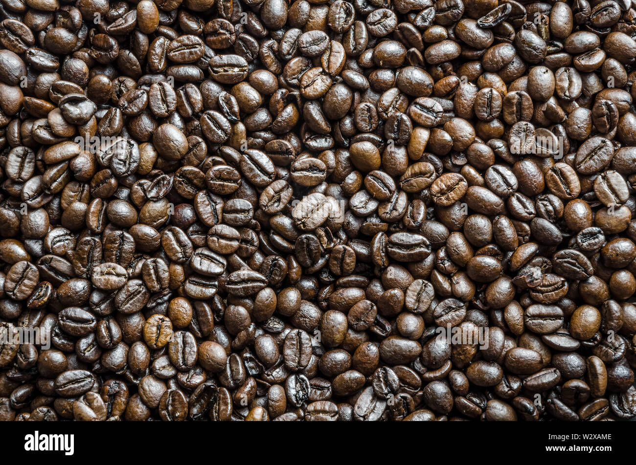 Roasted espresso coffee beans, flat lay view from directly above Stock