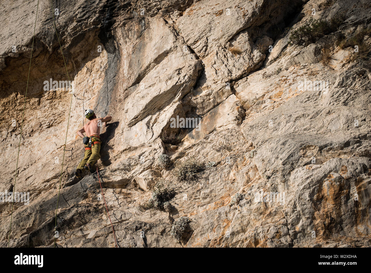 Young man climbing vertical wall. Croatia, SPLIT Stock Photo