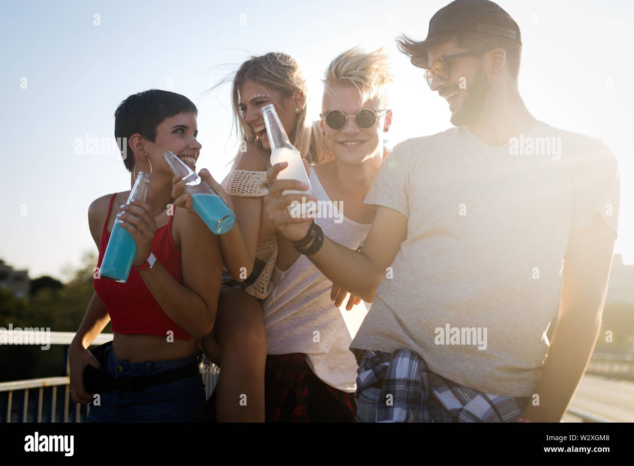 Group of young friends having fun together Stock Photo - Alamy