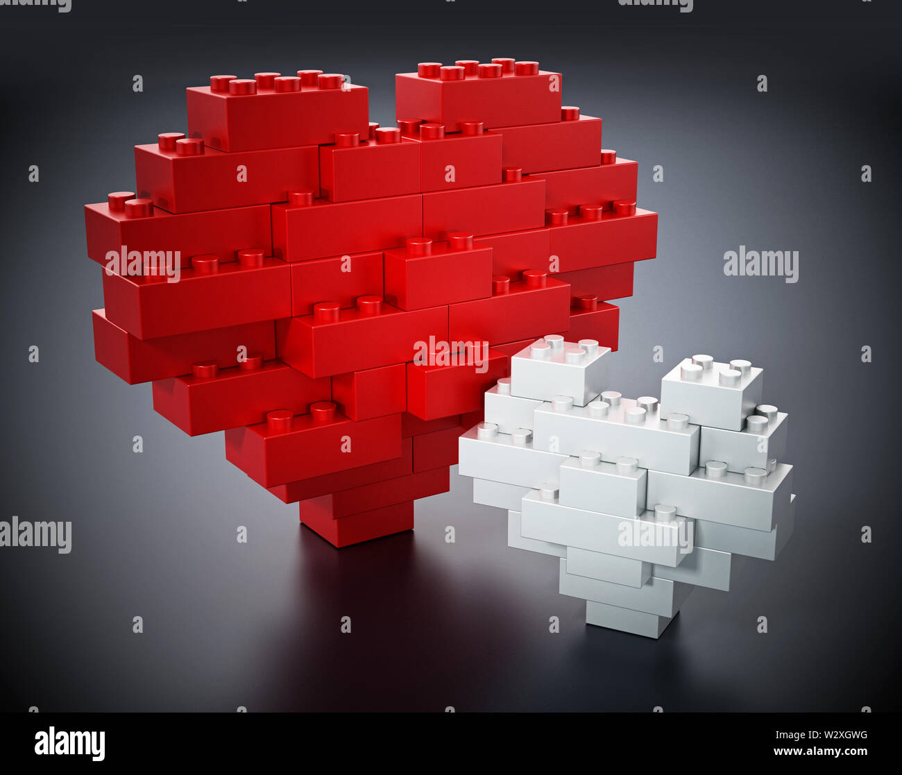 Red and white building blocks forming big and small heart shapes. 3D illustration. Stock Photo