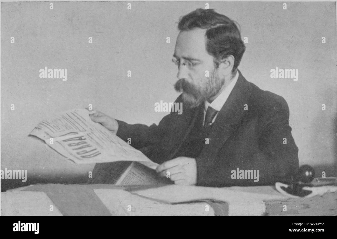 Lev Kamenev reads Pravda Stock Photo