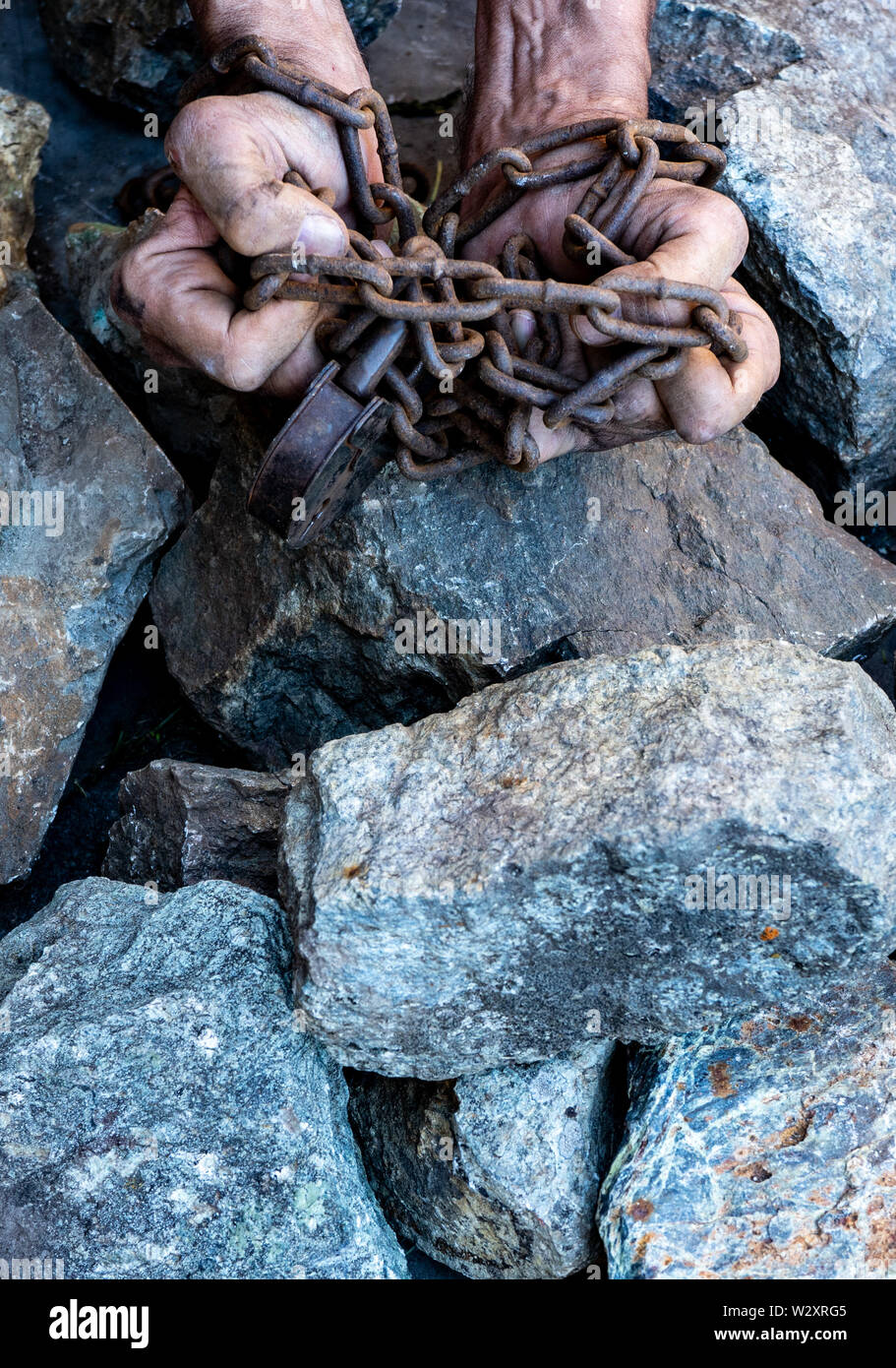 The hands of a slave in an attempt to release. The symbol of slave