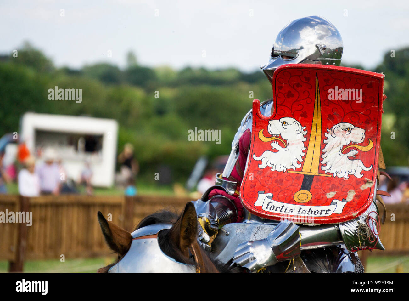 Brackley, UK - June 7th 2019: People dressed as medieval knights on horseback take part in a jousting competition Stock Photo