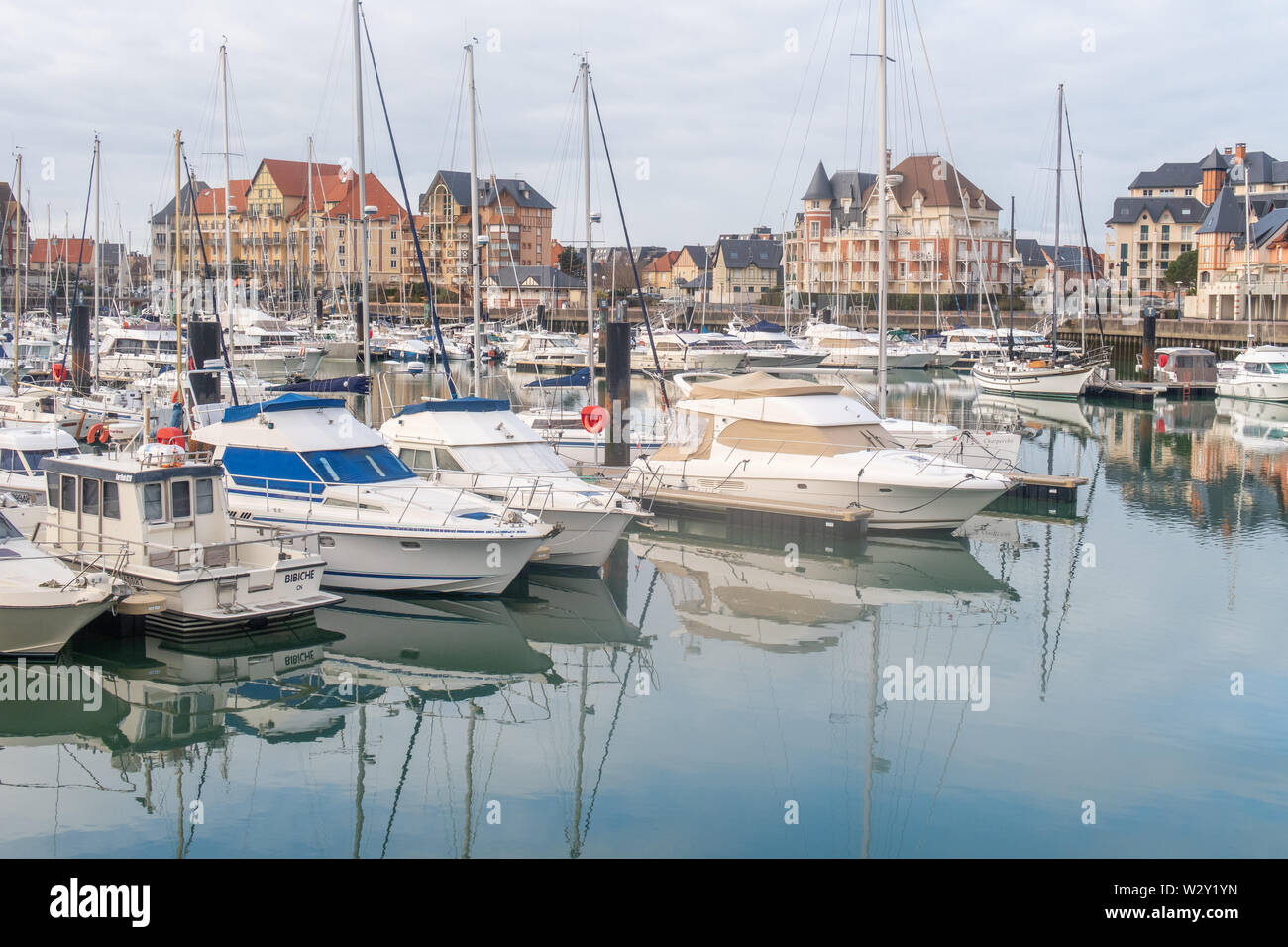 Dives-Sur-Mer, France - January 3, 2019: the harbour, boats, and buildings at dives-sur-mer Stock Photo