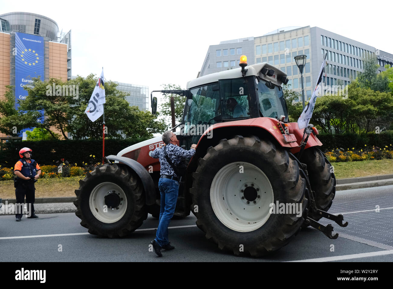 Brussels, Belgium. 11th July 2019. Tractors are seen outside of EU Commission Headquarters as farmers  take part in a protest against the EU's Mercosur trade deal. Credit: ALEXANDROS MICHAILIDIS/Alamy Live News Stock Photo