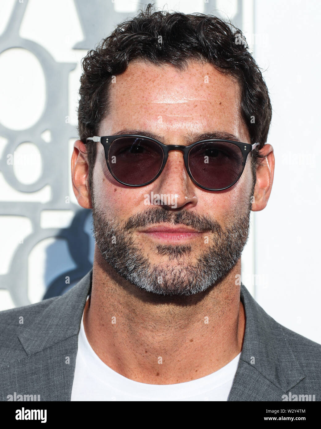 BEVERLY HILLS, LOS ANGELES, CALIFORNIA, USA - JULY 10: Actor Tom Ellis arrives at the American Friends Of Covent Garden 50th Anniversary Celebration held at Jean-Georges Beverly Hills at Waldorf Astoria Beverly Hills on July 10, 2019 in Beverly Hills, Los Angeles, California, United States. (Photo by Xavier Collin/Image Press Agency) Stock Photo