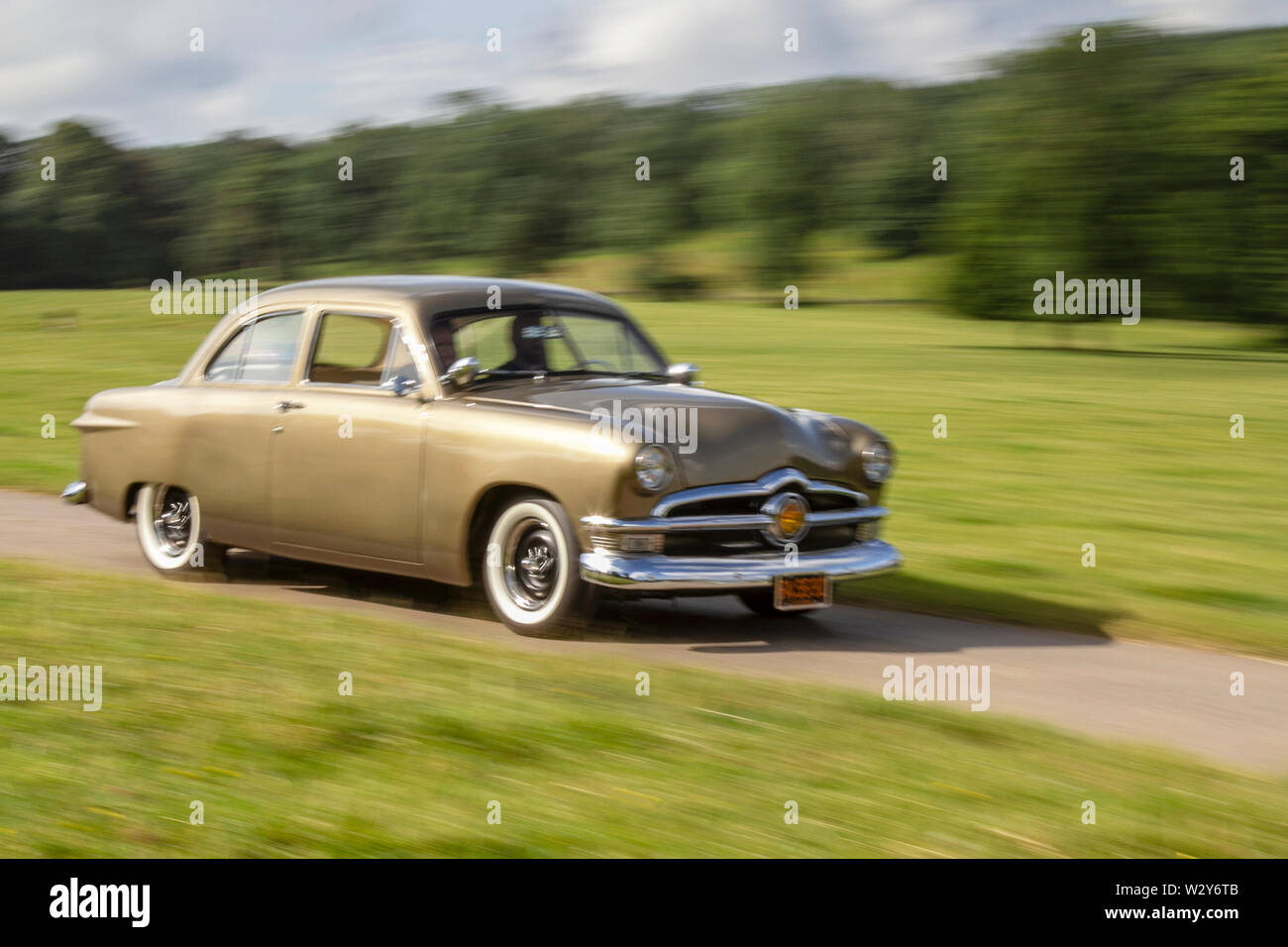 1950 Ford Custom Sedan American Automobile Gold American Saloon At The Classic Car Rally Held On